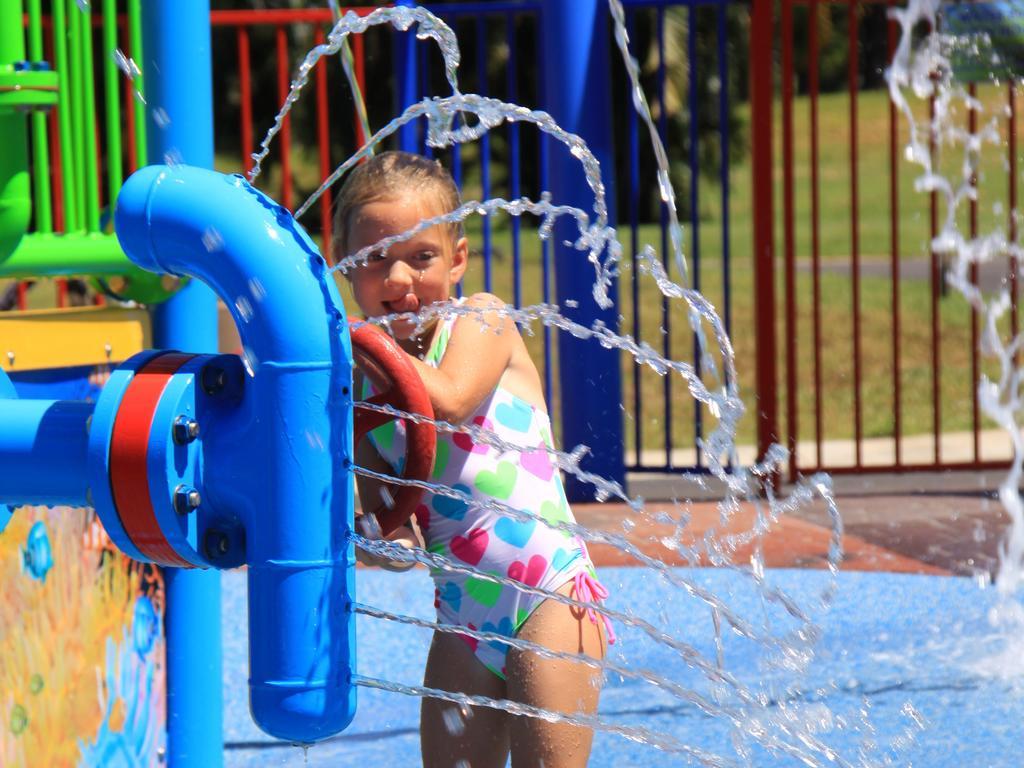 Ingenia Holidays Cairns Coconut Dış mekan fotoğraf A child playing at the water park